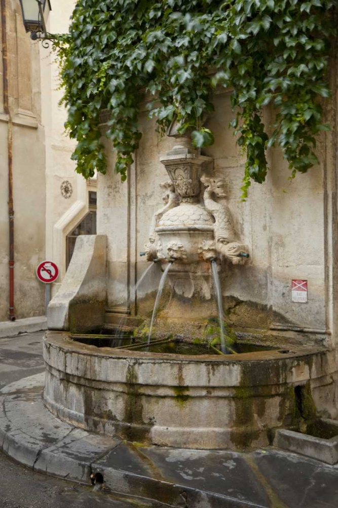 France, Provence, Water fountain on street corner art print by Fred Lord for $57.95 CAD